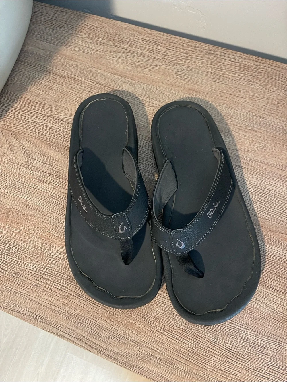 Olukai Men's Black Leather Flip-Flop Sandals